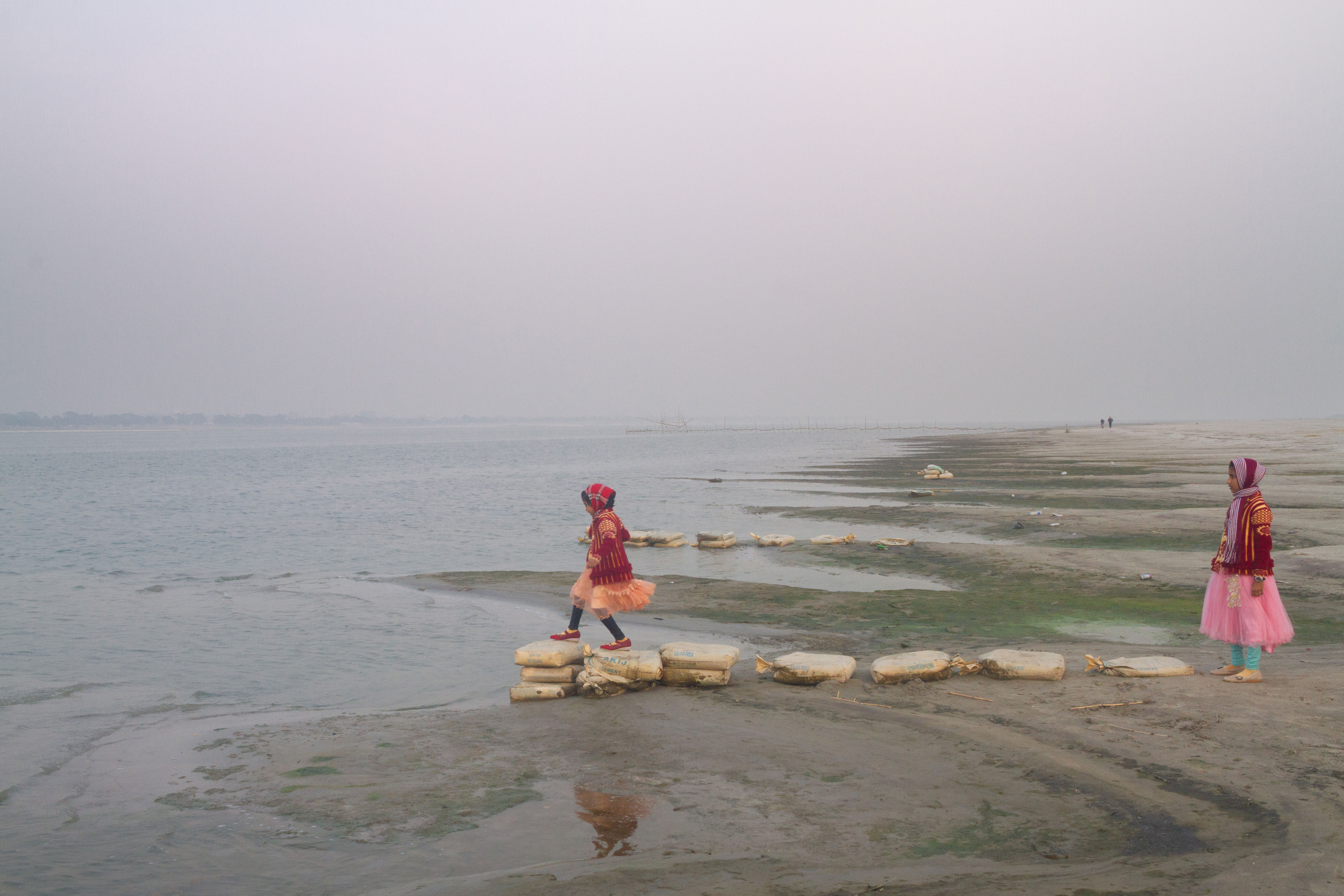 Drawn by curiosity, people often come closer to the river—seeking stories in its flow.