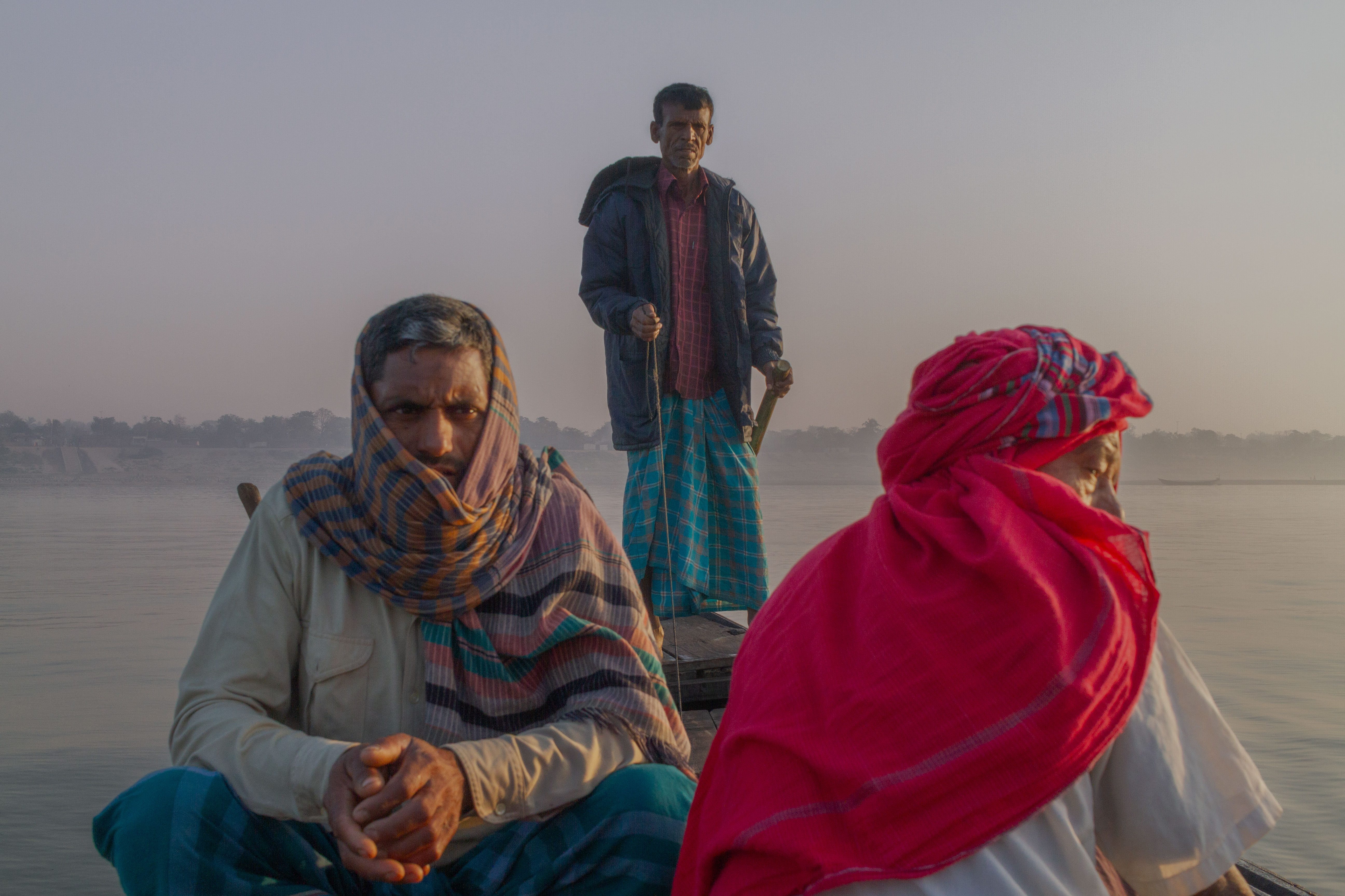 Carrying the weight of the river’s silence, their eyes tell stories the water keeps. Drifting between dusk and dawn, they belong to the journey, not the shore .