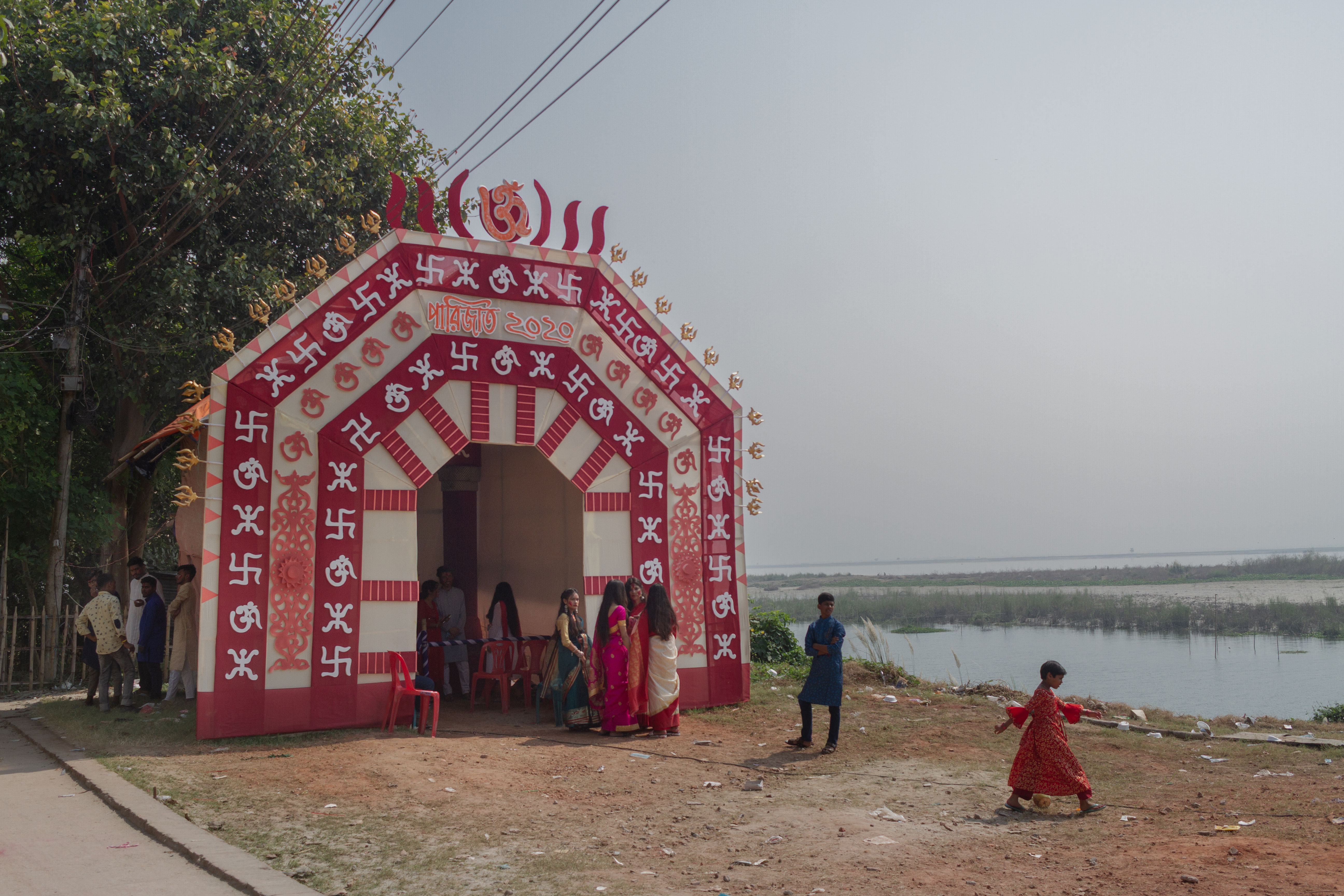 Among the sacred symbols of Om and Swastika, devotion finds its home in tradition’s tender embrace. A gateway to purity and surrender, where faith flows like an eternal river.